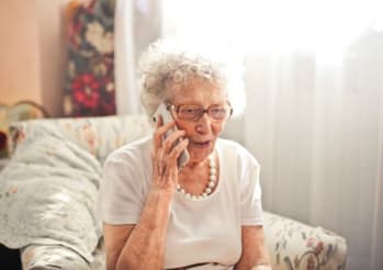 old woman talking on the phone
